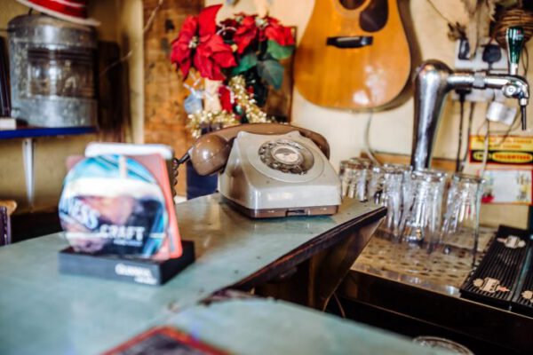 Guitars and glasses at the end of the bar counter